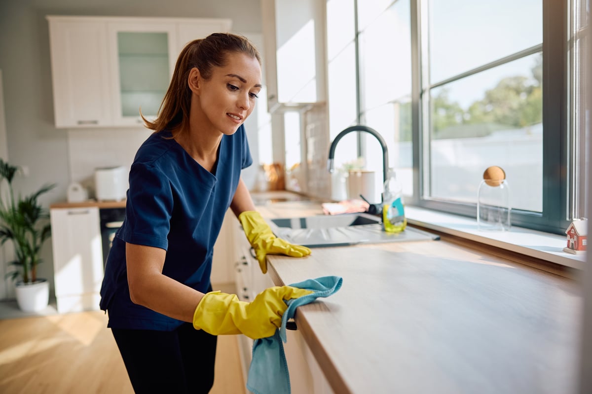 Professional cleaner working in a home